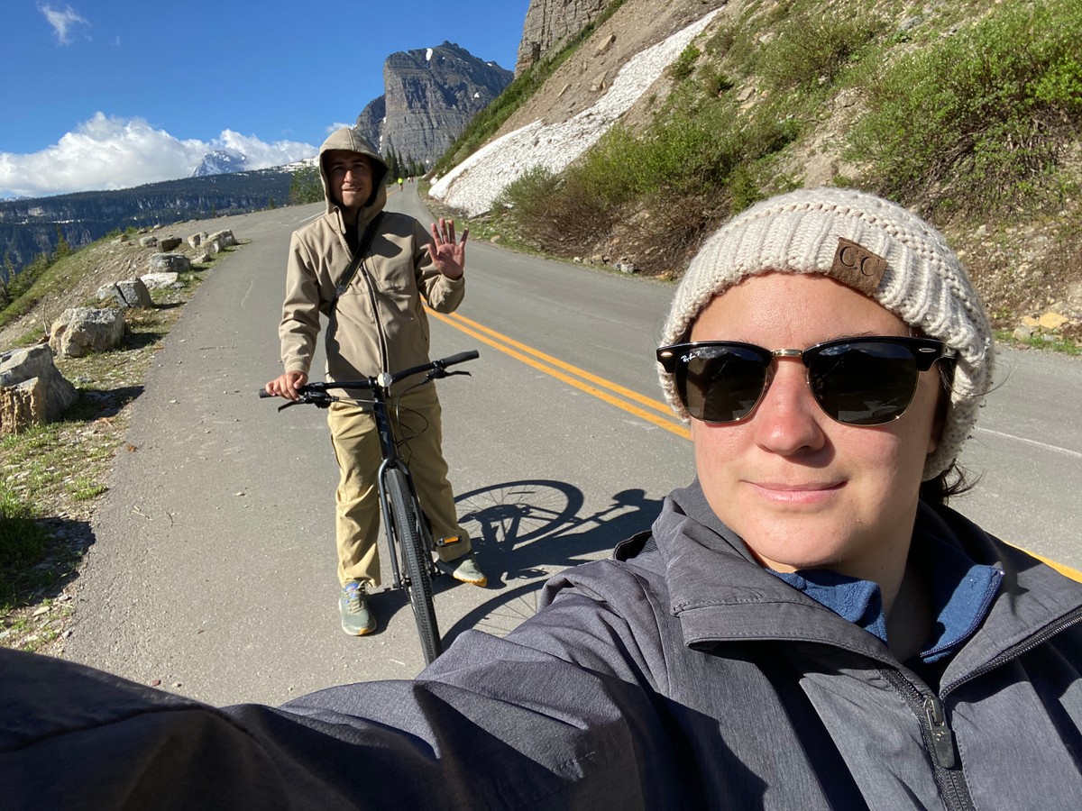 a man and woman on a road