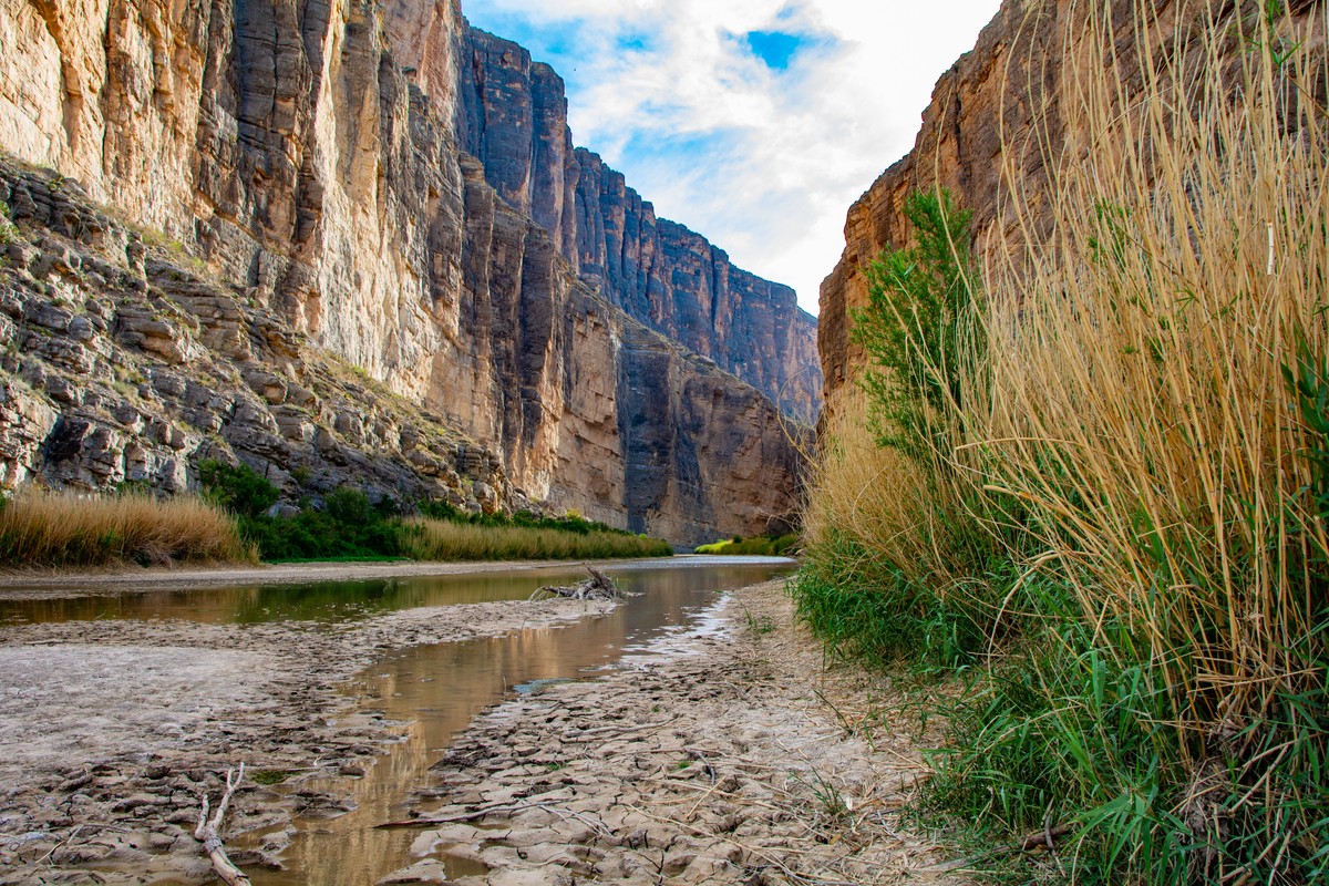 a river running between rocky cliffs