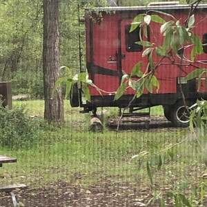 a red trailer with a trailer