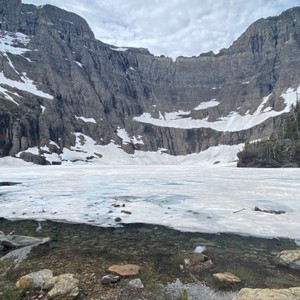 a river running through a snowy mountainous region