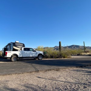 a white truck parked on a road