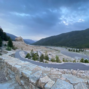 a river with rocks and trees