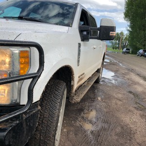 a white truck on a road