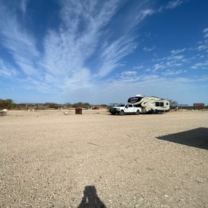 a group of vehicles parked in a field