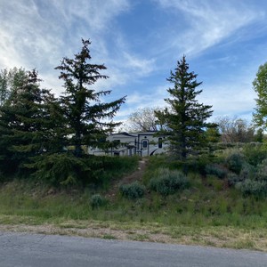 a house with trees in front of it