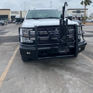 a black truck with a large rack
