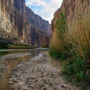 a river running between cliffs