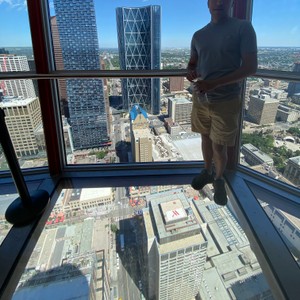 a man standing on a high rise building