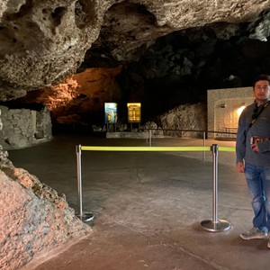 a man standing in a tunnel