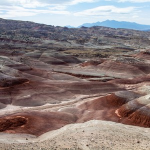 a rocky canyon with a blue sky