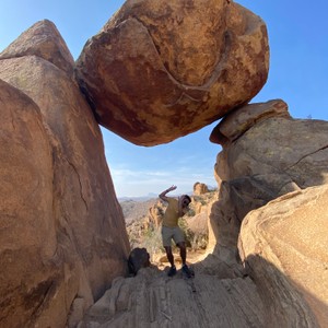 a person climbing a rock