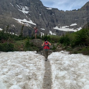 a person walking on a rocky path