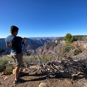 a man standing on a hill