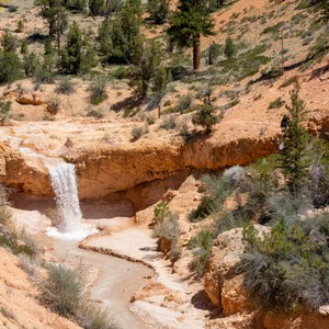 a waterfall in a rocky area