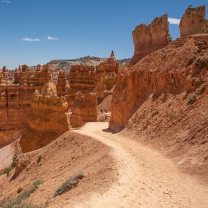 a dirt road in a desert