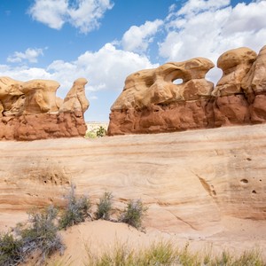 a desert landscape with a few large rocks