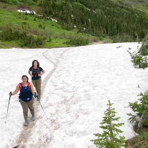 a couple of people cross country skiing