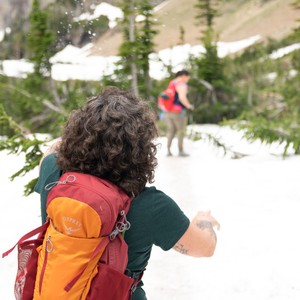 a person walking on a snowy path