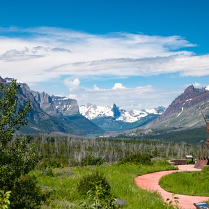 a path leading to a mountain range