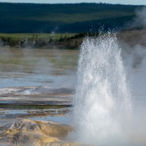 a large waterfall with a large waterfall