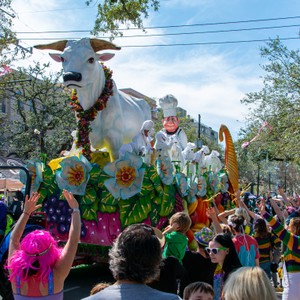 a person in a garment with a crowd of people