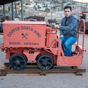 a man sitting on a train