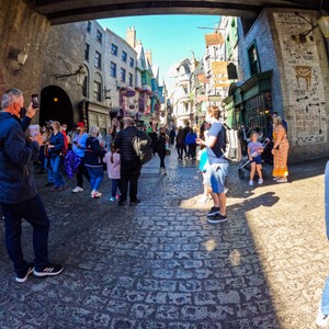 a group of people walking on a street